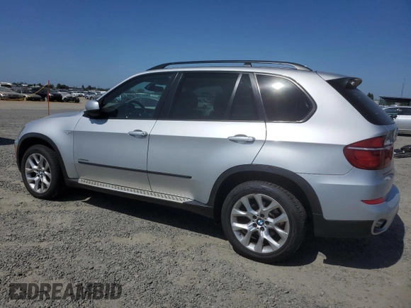 2012 BMW X5 35i with VIN 5UXZV4C5XCL751020, listed as a Copart auction lot 59327845 with 106,249 mi miles and Salvage title. Bid and sale history available at DreamBid. Image 2.
