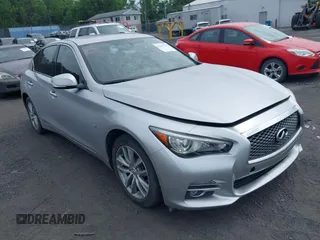 2015 Infiniti Q50 Sport with VIN JN1BV7AR1FM396590, listed as a IAAI auction lot 42687130 with 104,265 mi miles and . Bid and sale history available at DreamBid. Image 1.