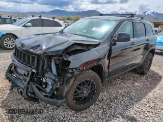 2016 Jeep Grand Cherokee Laredo z VIN 1C4RJFAG9GC302771, wystawiony jako Copart lot #54898085 z przebiegiem 60 463 mil mil oraz Szkoda całkowita • Salvage title. Historia ofert i sprzedaży dostępna na DreamBid. Obrazek 1.