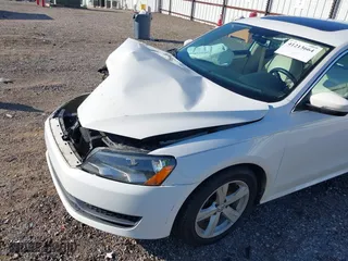 2013 Volkswagen Passat SE w/Sunroof with VIN 1VWBH7A31DC007320, listed as a IAAI auction lot 41213664 with 164,040 mi miles. Bid and sale history available at carsss.com. Image 14.