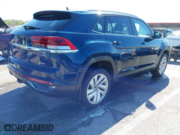 2021 Volkswagen Atlas SE z VIN 1V2KE2CA7MC220524, wystawiony jako IAAI lot #42017287 z przebiegiem 29 380 mil mil oraz . Historia ofert i sprzedaży dostępna na DreamBid. Obrazek 4.
