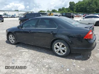 2012 Ford Fusion SE with VIN 3FAHP0HA6CR413577, listed as a Copart auction lot 63110305 with 110,915 mi miles and Salvage title. Bid and sale history available at DreamBid. Image 2.