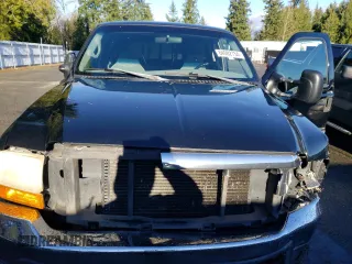 1999 Ford F-350 XL z VIN 1FTSX31F0XEC31633, wystawiony jako Copart lot #84082754 z przebiegiem 192 085 mil mil oraz Szkoda całkowita • Salvage title. Historia ofert i sprzedaży dostępna na DreamBid. Obrazek 11.