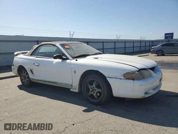 1998 Ford Mustang with VIN 1FAFP4448WF269580, listed as a Copart auction lot 54861155 with 304,869 mi miles and Salvage title. Bid and sale history available at DreamBid. Image 4.