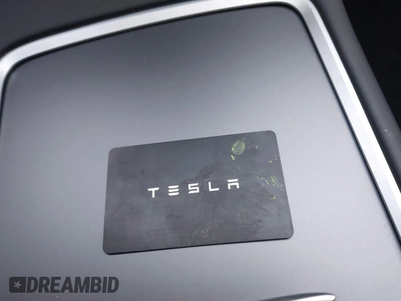 2023 Tesla Model 3 Long Range with VIN 5YJ3E1EB3PF389517, listed as a IAAI auction lot 41484978 with 13,411 mi miles and . Bid and sale history available at DreamBid. Image 11.