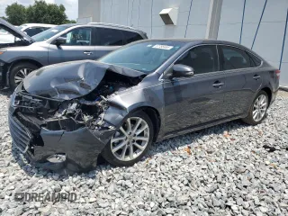 2014 Toyota Avalon Limited z VIN 4T1BK1EB4EU098190, wystawiony jako Copart lot #57756465 z przebiegiem 91 043 mil mil oraz Szkoda całkowita • Salvage title. Historia ofert i sprzedaży dostępna na DreamBid. Obrazek 1.