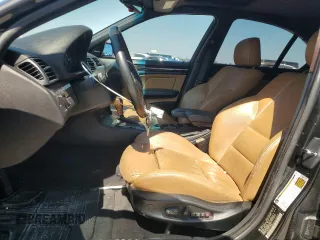 2005 BMW 3 Series 330i with VIN WBAEV53405KM43213, listed as a Copart auction lot 74597414 with 182,881 mi miles and Salvage Title. Bid and sale history available at carsss.com. Image 7.