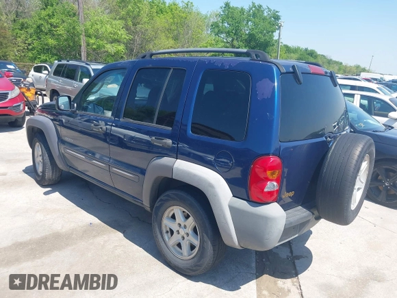 2004 Jeep Liberty Sport with VIN 1J4GK48KX4W241129, listed as a IAAI auction lot 41980258 with 259,048 mi miles and . Bid and sale history available at DreamBid. Image 3.