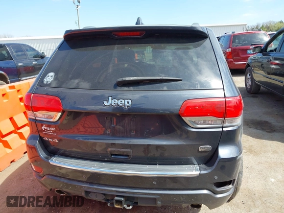 2015 Jeep Grand Cherokee Overland with VIN 1C4RJFCG6FC831641, listed as a IAAI auction lot 41877680 with 143,568 mi miles. Bid and sale history available at carsss.com. Image 16.