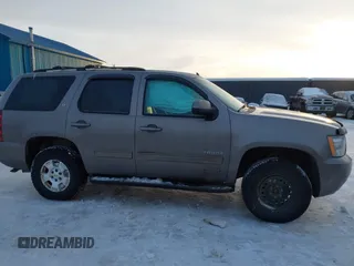 2013 Chevrolet Tahoe LT with VIN 1GNSKBE0XDR296094, listed as a IAAI auction lot 41448160 with 167,165 mi miles and . Bid and sale history available at DreamBid. Image 13.