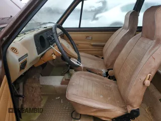 1979 Volkswagen Rabbit z VIN 1793863402, wystawiony jako Copart lot #79580954 z przebiegiem 82 349 mil mil oraz Tytuł czysty. Historia ofert i sprzedaży dostępna na DreamBid. Obrazek 7.