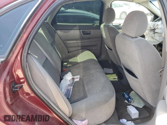 2007 Ford Taurus SE z VIN 1FAFP53U07A165204, wystawiony jako Copart lot #52170345 z przebiegiem Nie podano mil oraz Szkoda całkowita • Salvage title. Historia ofert i sprzedaży dostępna na DreamBid. Obrazek 10.