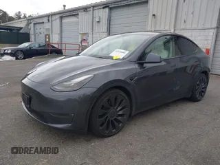 2022 Tesla Model Y Performance z VIN 7SAYGDEF5NF544542, wystawiony jako IAAI lot #42118855 z przebiegiem 27 256 mil mil oraz . Historia ofert i sprzedaży dostępna na DreamBid. Obrazek 2.