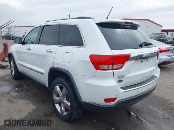 2013 Jeep Grand Cherokee Overland with VIN 1C4RJECG5DC648593, listed as a IAAI auction lot 41576630 with 187,098 mi miles. Bid and sale history available at carsss.com. Image 3.
