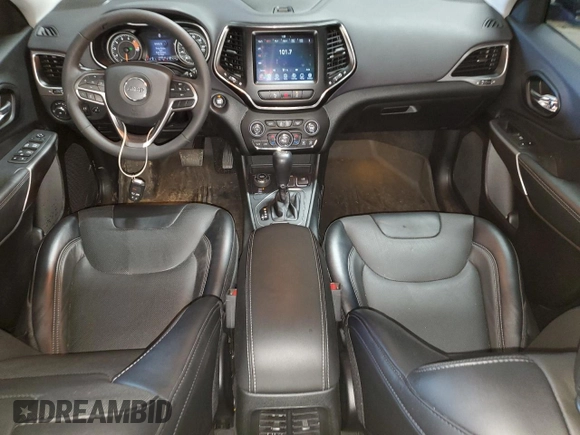 2022 Jeep Cherokee Latitude Lux z VIN 1C4PJMMX0ND502033, wystawiony jako Copart lot #59656985 z przebiegiem 21 055 mil mil oraz Szkoda całkowita • Salvage title. Historia ofert i sprzedaży dostępna na DreamBid. Obrazek 8.