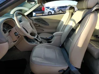2004 Ford Mustang Deluxe with VIN 1FAFP44414F125267, listed as a Copart auction lot 74595714 with 0 mi miles and Salvage Title. Bid and sale history available at carsss.com. Image 7.