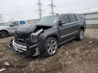 2016 Cadillac Escalade Platinum z VIN 1GYS4DKJ3GR354153, wystawiony jako Copart lot #82494394 z przebiegiem 124 561 mil mil oraz Szkody całkowita. Historia ofert i sprzedaży dostępna na DreamBid. Obrazek 1.