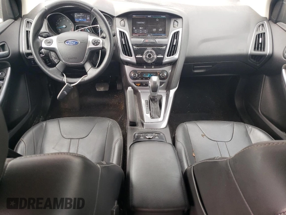 2014 Ford Focus Titanium with VIN 1FADP3N29EL422689, listed as a Copart auction lot 59817535 with 105,515 mi miles and Salvage title. Bid and sale history available at DreamBid. Image 8.