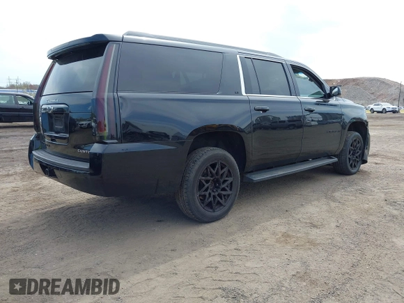 2017 Chevrolet Suburban LT with VIN 1GNSKHKCXHR194365, listed as a IAAI auction lot 42060690 with 213,424 mi miles and . Bid and sale history available at DreamBid. Image 4.