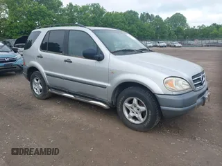 1999 Mercedes-Benz M 320/430/500 with VIN 4JGAB54E6XA105157, listed as a IAAI auction lot 42227146 with 112,668 mi miles and . Bid and sale history available at DreamBid. Image 1.