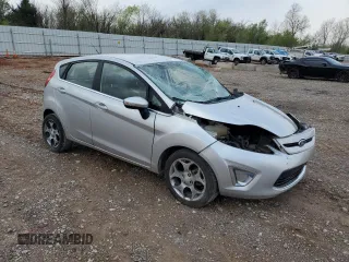 2011 Ford Fiesta SES with VIN 3FADP4FJ7BM186601, listed as a Copart auction lot 51461585 with 140,044 mi miles and Salvage Title. Bid and sale history available at carsss.com. Image 4.