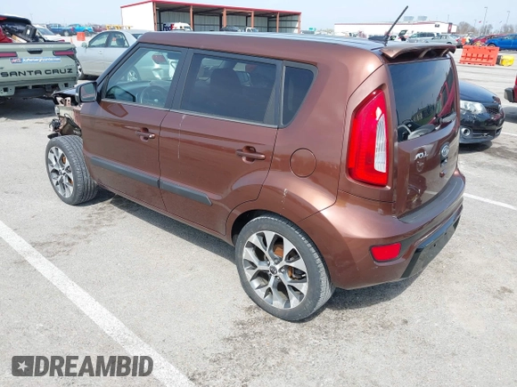 2012 Kia Soul + with VIN KNDJT2A63C7422074, listed as a IAAI auction lot 41911029 with 112,125 mi miles. Bid and sale history available at carsss.com. Image 3.