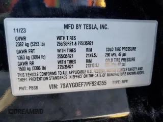 2023 Tesla Model Y Performance with VIN 7SAYGDEF7PF924355, listed as a Copart auction lot 47877055 with 64,663 mi miles and Salvage Title. Bid and sale history available at DreamBid. Image 15.