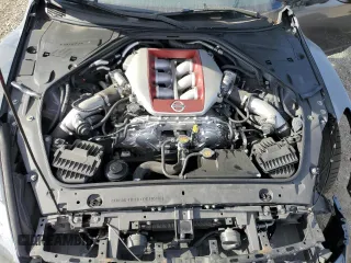 2017 Nissan GT-R Premium z VIN JN1AR5EF0HM820283, wystawiony jako Copart lot #80291674 z przebiegiem 98 489 mil mil oraz Szkoda całkowita • Salvage title. Historia ofert i sprzedaży dostępna na DreamBid. Obrazek 13.