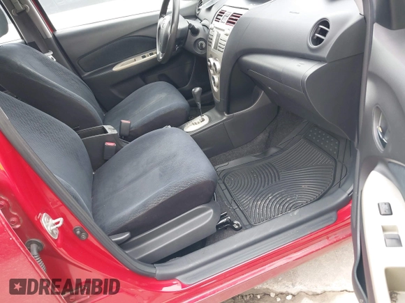 2007 Toyota Yaris with VIN JTDBT903071077664, listed as a IAAI auction lot 42175827 with 154,079 mi miles. Bid and sale history available at carsss.com. Image 5.