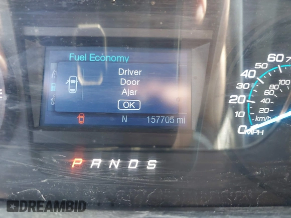 2013 Ford Taurus SEL with VIN 1FAHP2E88DG105557, listed as a IAAI auction lot 42040773 with 157,705 mi miles and . Bid and sale history available at carsss.com. Image 7.
