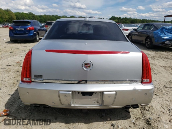 2009 Cadillac DTS 1SA z VIN 1G6KD57Y69U114700, wystawiony jako Copart lot #56007485 z przebiegiem 158 849 mil mil oraz Szkoda całkowita • Salvage title. Historia ofert i sprzedaży dostępna na DreamBid. Obrazek 6.