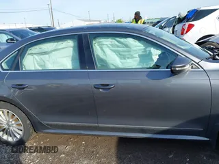 2016 Volkswagen Passat SE z VIN 1VWBT7A32GC016577, wystawiony jako IAAI lot #42334269 z przebiegiem 128 006 mil mil oraz . Historia ofert i sprzedaży dostępna na DreamBid. Obrazek 13.