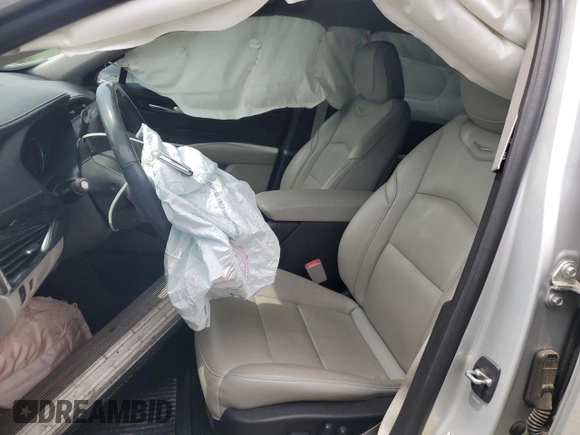 2021 Cadillac XT4 FWD Premium Luxury z VIN 1GYFZCR40MF000293, wystawiony jako Copart lot #58710565 z przebiegiem 49 721 mil mil oraz Szkoda całkowita • Salvage title. Historia ofert i sprzedaży dostępna na DreamBid. Obrazek 7.