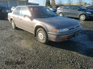 1992 Honda Accord LX z VIN JHMCB7651NC030132, wystawiony jako Copart lot #85348914 z przebiegiem 240 380 mil mil oraz Szkoda całkowita • Salvage title. Historia ofert i sprzedaży dostępna na DreamBid. Obrazek 11.