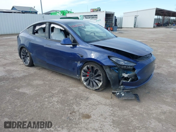 2021 Tesla Model Y Performance z VIN 5YJYGDEF8MF245641, wystawiony jako IAAI lot #41685230 z przebiegiem 25 903 mil mil oraz . Historia ofert i sprzedaży dostępna na DreamBid. Obrazek 1.