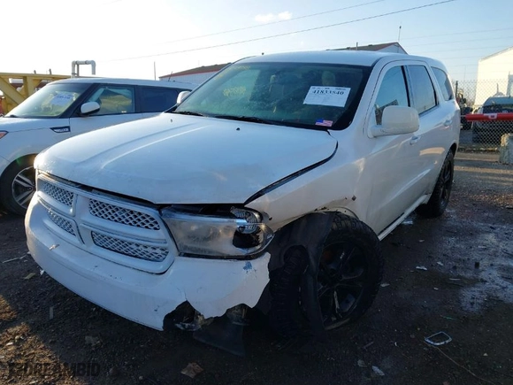 2013 Dodge Durango SXT with VIN 1C4RDJAGXDC564904, listed as a IAAI auction lot 41833540 with 208,581 mi miles. Bid and sale history available at carsss.com. Image 2.