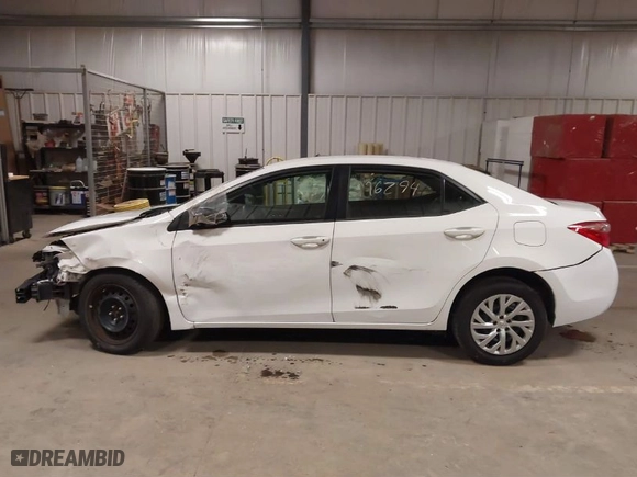 2019 Toyota Corolla L with VIN 2T1BURHE0KC206610, listed as a IAAI auction lot 40196294 with 117,409 mi miles. Bid and sale history available at carsss.com. Image 13.