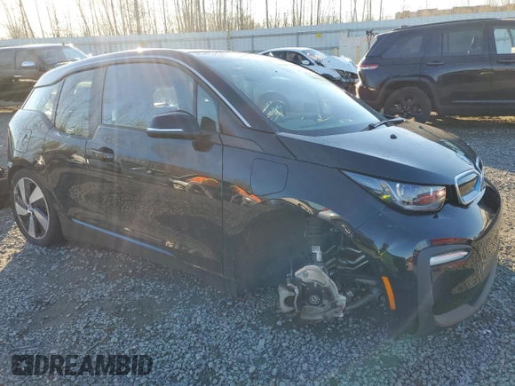2020 BMW i3 z VIN WBY8P4C08L7G07617, wystawiony jako Copart lot #42570015 z przebiegiem 2 470 mil mil oraz Szkoda całkowita • Salvage title. Historia ofert i sprzedaży dostępna na DreamBid. Obrazek 4.