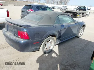2001 Ford Mustang Deluxe with VIN 1FAFP44451F130290, listed as a IAAI auction lot 41777828 with 1 mi miles. Bid and sale history available at carsss.com. Image 4.