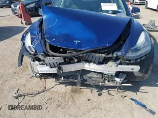 2018 Tesla Model 3 Long Range Battery with VIN 5YJ3E1EA6JF027065, listed as a IAAI auction lot 40532631 with 55,316 mi miles. Bid and sale history available at carsss.com. Image 6.