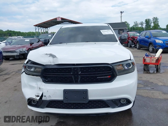 2019 Dodge Durango SXT Plus with VIN 1C4RDJAG3KC821124, listed as a IAAI auction lot 42214374 with 102,134 mi miles and . Bid and sale history available at DreamBid. Image 12.