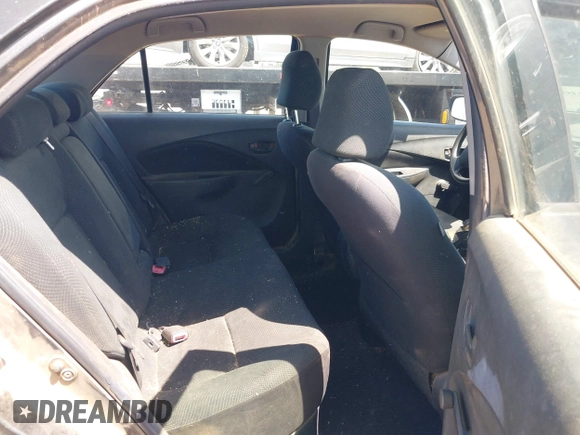 2009 Toyota Yaris with VIN JTDBT903891349784, listed as a IAAI auction lot 42135557 with 244,107 mi miles. Bid and sale history available at carsss.com. Image 8.