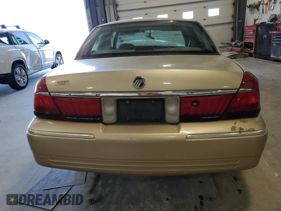 2000 Mercury Grand Marquis LS z VIN 2MEFM75W9YX660599, wystawiony jako Copart lot #52620225 z przebiegiem 88 726 mil mil oraz Szkoda całkowita • Salvage title. Historia ofert i sprzedaży dostępna na DreamBid. Obrazek 6.