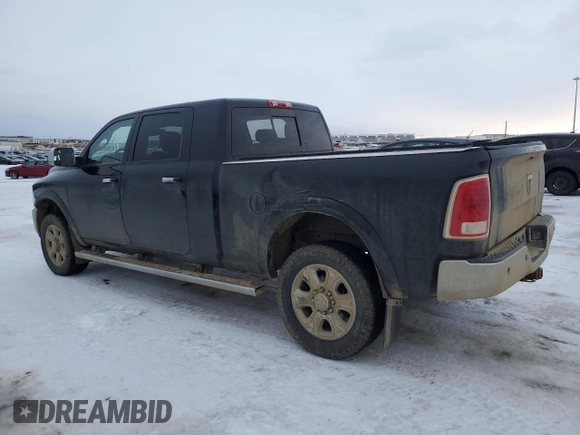 2014 Ram 3500 Laramie with VIN 3C63R3ML6EG325772, listed as a Copart auction lot 87158104 with 495,759 mi miles and Salvage Title. Bid and sale history available at carsss.com. Image 2.