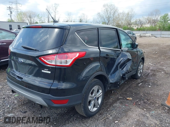 2013 Ford Escape SE with VIN 1FMCU0GX1DUA99040, listed as a IAAI auction lot 42084787 with 140,473 mi miles and . Bid and sale history available at DreamBid. Image 4.