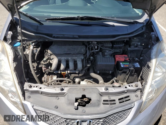 2010 Honda Fit Sport with VIN JHMGE8H69AS025801, listed as a Copart auction lot 58416375 with 216,216 mi miles and Clean title. Bid and sale history available at DreamBid. Image 11.