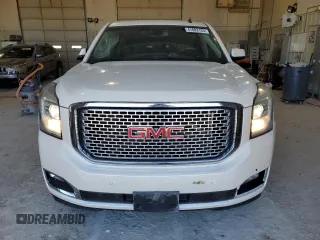 2015 GMC Yukon Denali with VIN 1GKS2CKJ7FR266750, listed as a Copart auction lot 47882125 with 121,705 mi miles and Salvage Title. Bid and sale history available at carsss.com. Image 5.