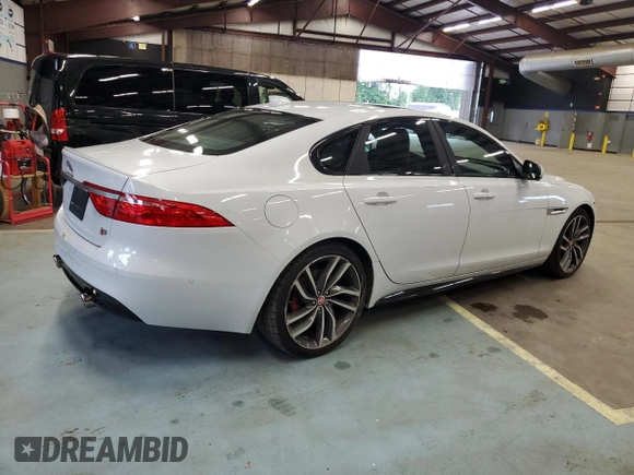 2016 Jaguar XF S with VIN SAJBG4BV0GCY00411, listed as a Copart auction lot 66068964 with 94,983 mi miles and Salvage Title. Bid and sale history available at carsss.com. Image 3.
