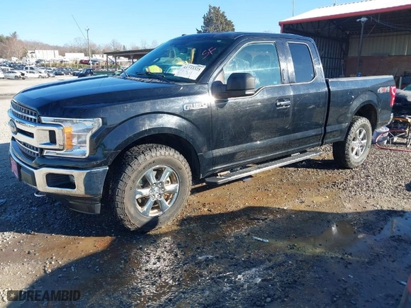 2018 Ford F-150 XL with VIN 1FTFX1E54JFB12847, listed as a IAAI auction lot 41733325 with 162,546 mi miles. Bid and sale history available at carsss.com. Image 2.