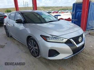 2020 Nissan Maxima SV z VIN 1N4AA6CV6LC366887, wystawiony jako IAAI lot #41952159 z przebiegiem 100 182 mil mil oraz . Historia ofert i sprzedaży dostępna na DreamBid. Obrazek 1.